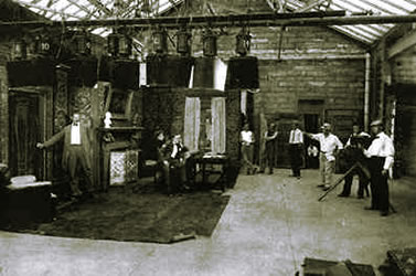 Interior Of The Vitagraph Studios (ca. 1899) Showing  Set, Camera, Cameramen, Hanging Arc Lamps And Glass Roof